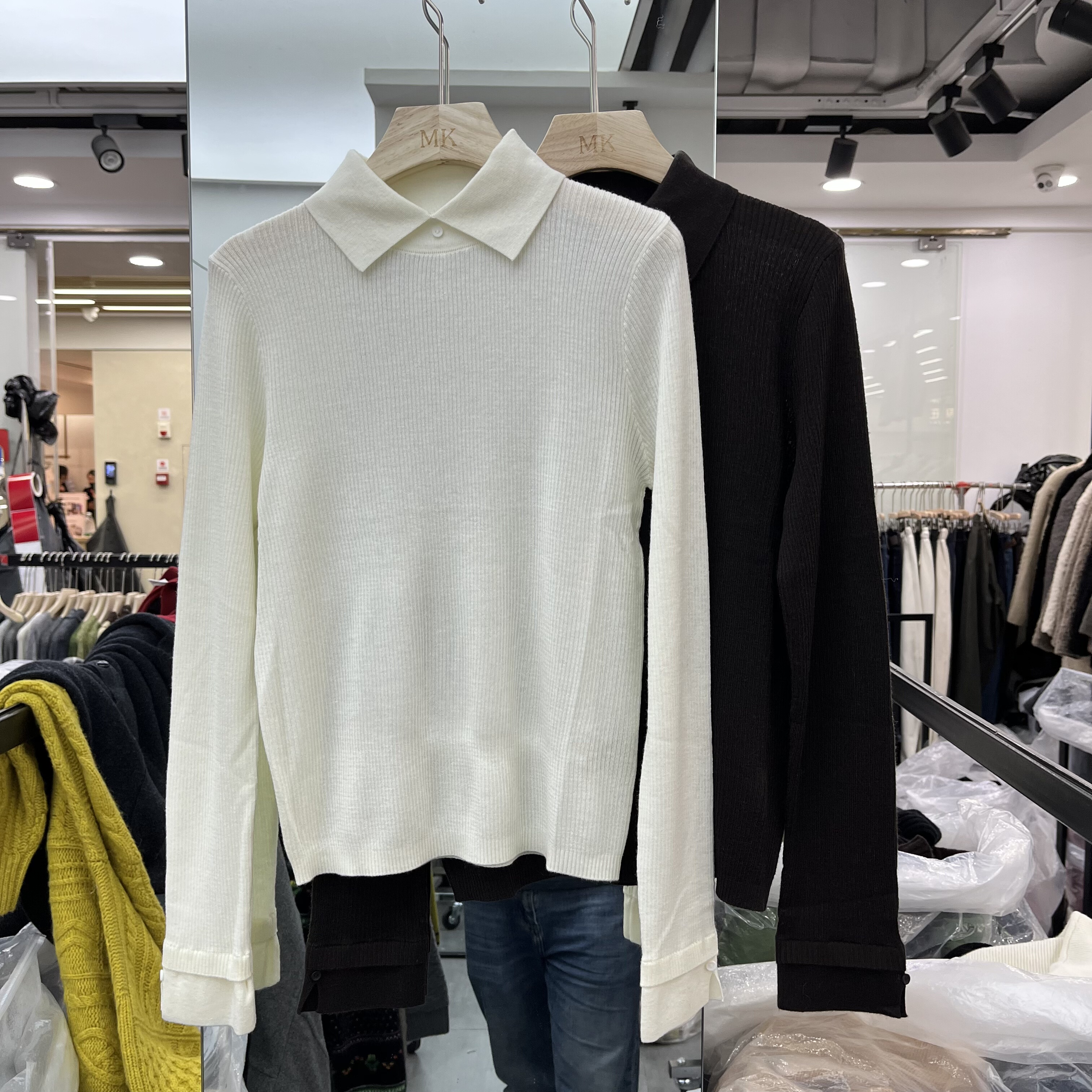 欧洲站2025秋季新款女士翻领简约纯色细羊毛长袖毛衣欧货宽松针织