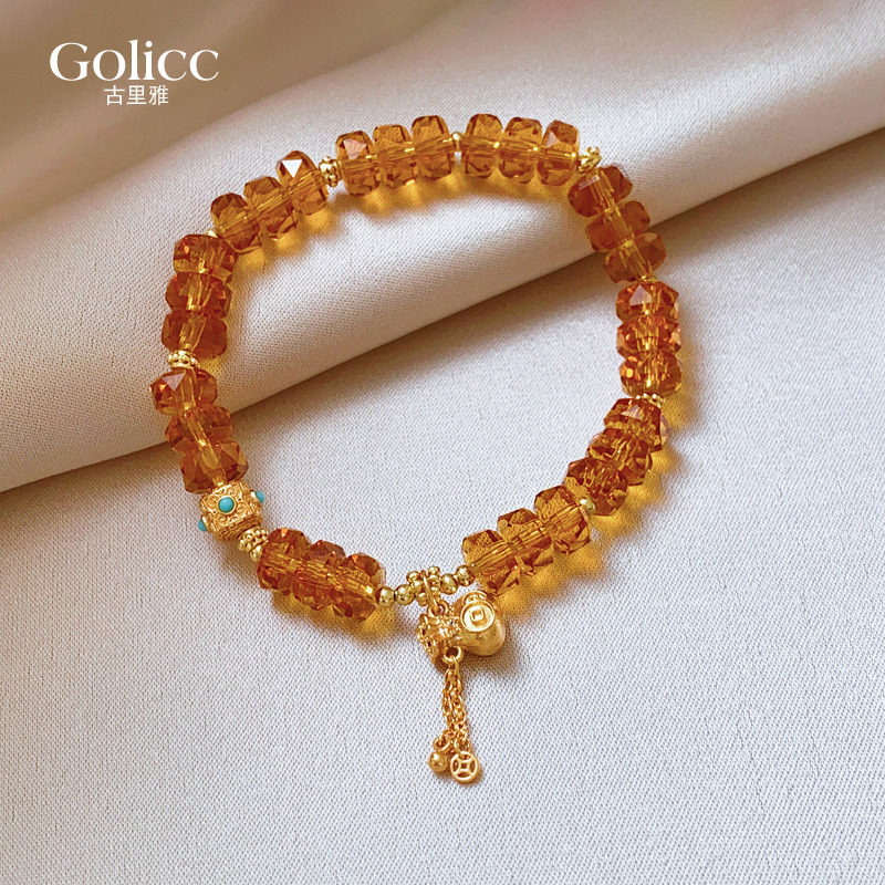 金色福袋钱币串珠茶晶吊坠手链女轻奢小众精致手串2026新款手饰品