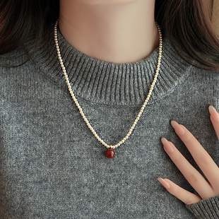 红色元素玛瑙珍珠毛衣项链配饰女颈链高级感轻奢小众2025新款吊坠