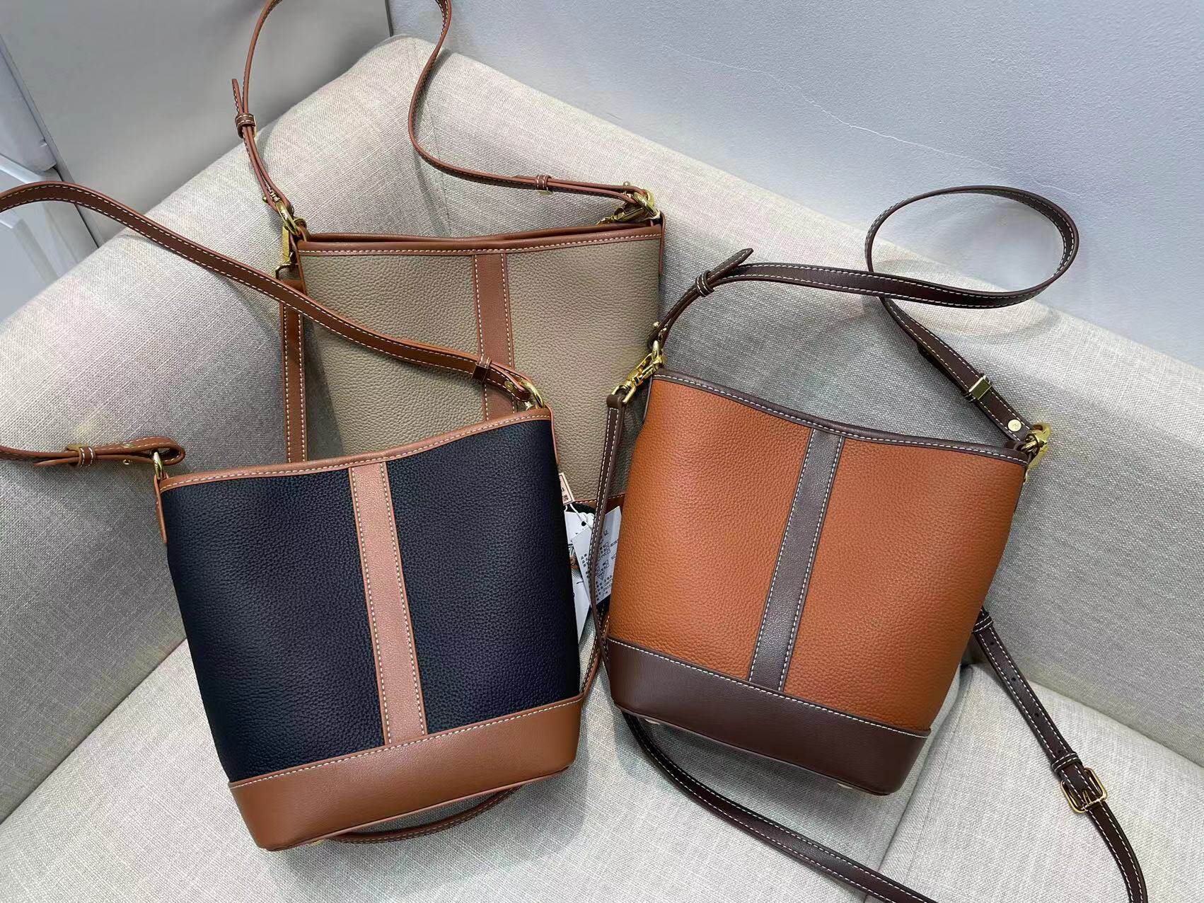 莎娜shanna撞色牛皮百搭实用单肩斜跨空间大女款桶包