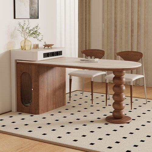 圆弧洞石岩板桌面中古风岛台餐桌