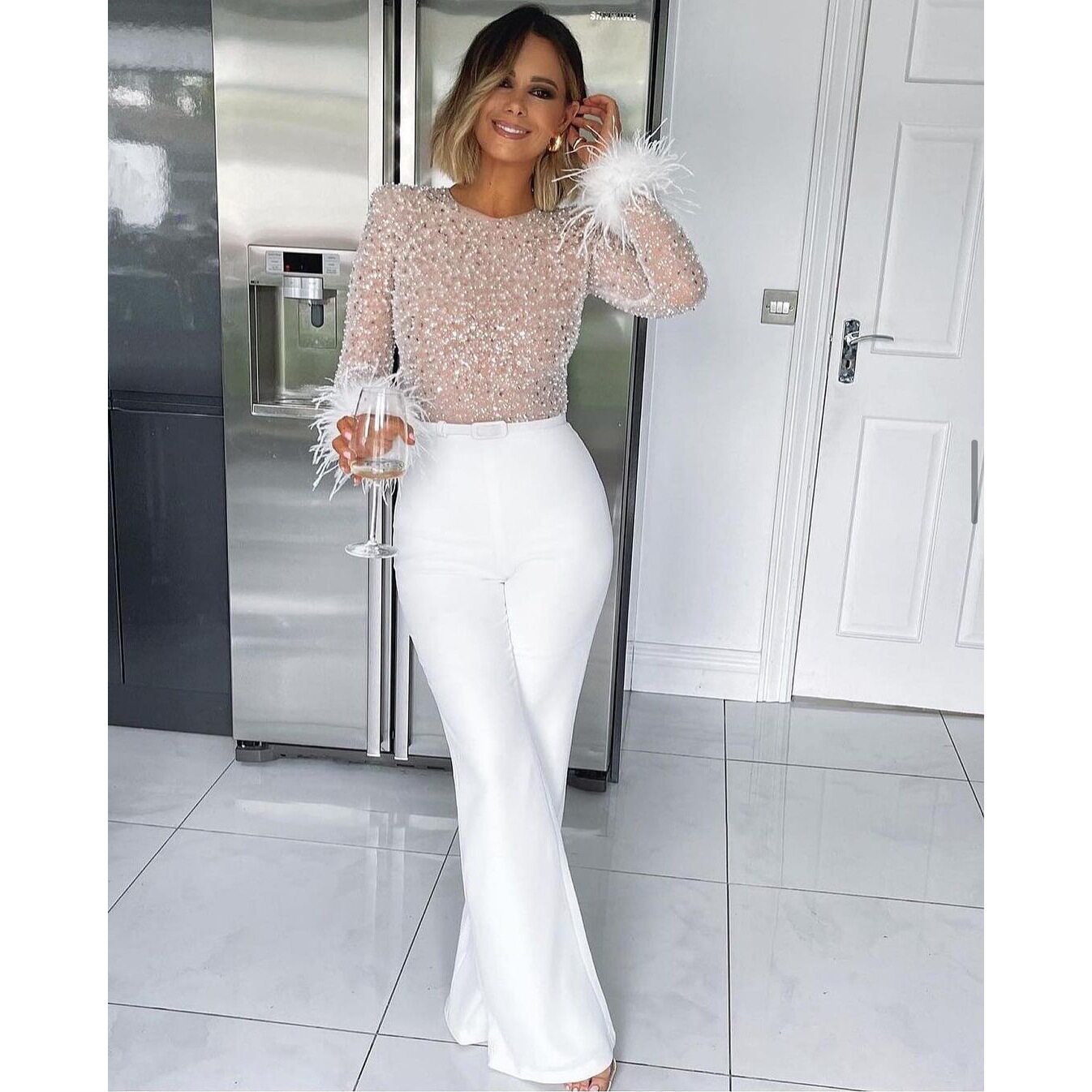 Women's casual long sleeve Jumpsuit pants 时尚羽毛拼接连体裤