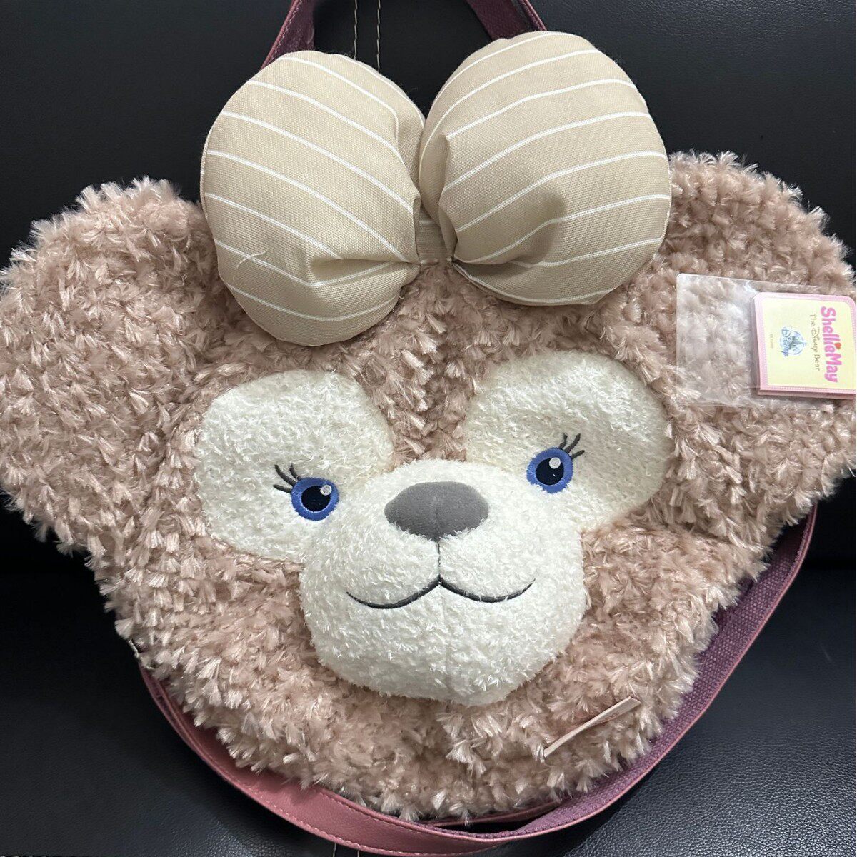 迪士尼乐园正品露思达菲熊雪莉玫毛绒双肩包手提单肩包大脸包女