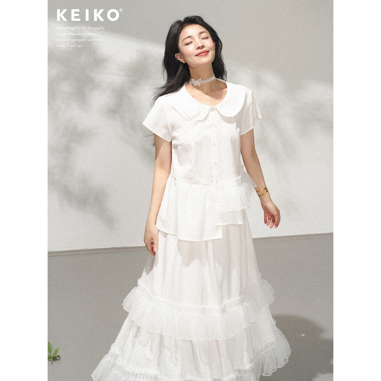 KEIKO不对称白色娃娃领衬衫女冷萌感小上衣女夏不对称上衣+半身裙