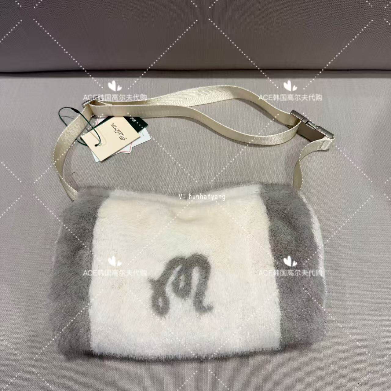 Malbon高尔夫暖手袋女士26冬季