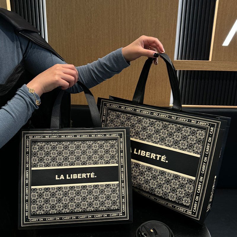 新款黑色无纺布服装店手提袋礼品包装礼袋购物大号袋子衣服打包袋