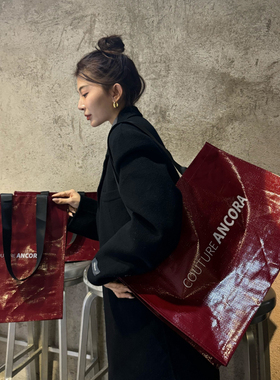 高级感安可拉红立体包编织袋服装店手提袋大容量包装袋购物袋