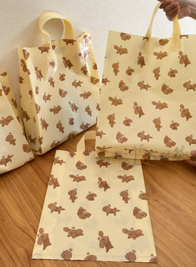 ins 奶油黄布丁狗童装手提袋塑料男女装包装袋衣服袋子加厚可爱袋