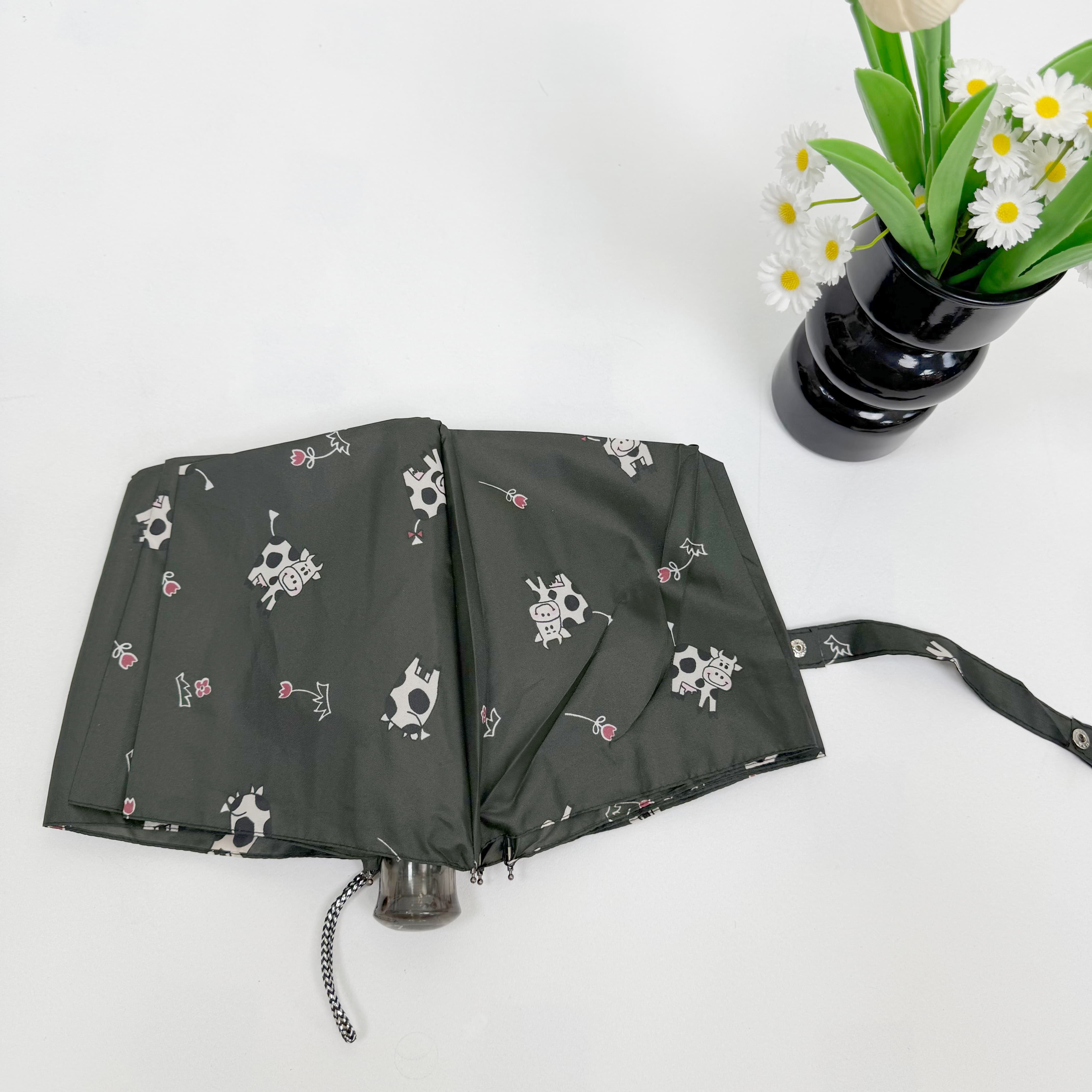 可爱卡通小奶牛印花三折手动雨伞防紫外线日常通勤晴雨两用遮阳伞