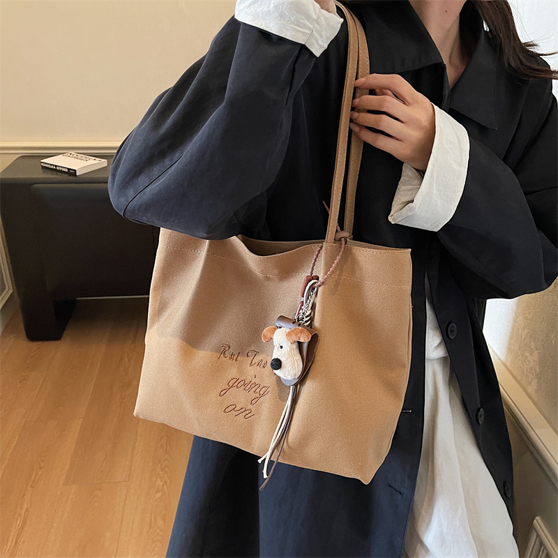 刺绣帆布包女2025新款时尚百搭