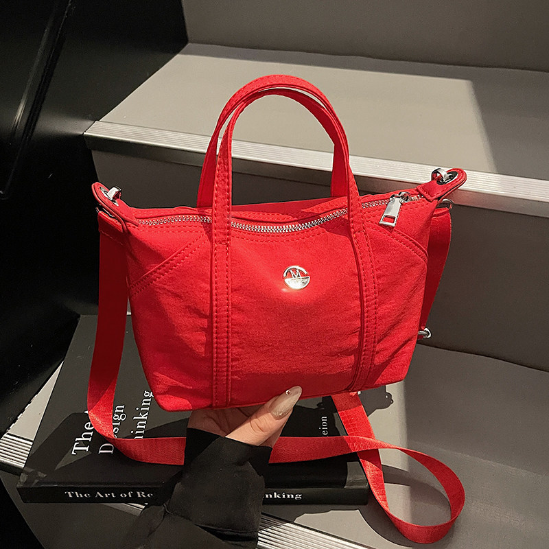 红色帆布包2025新款时尚百搭手提小包尼龙单肩手提斜挎包饺子包