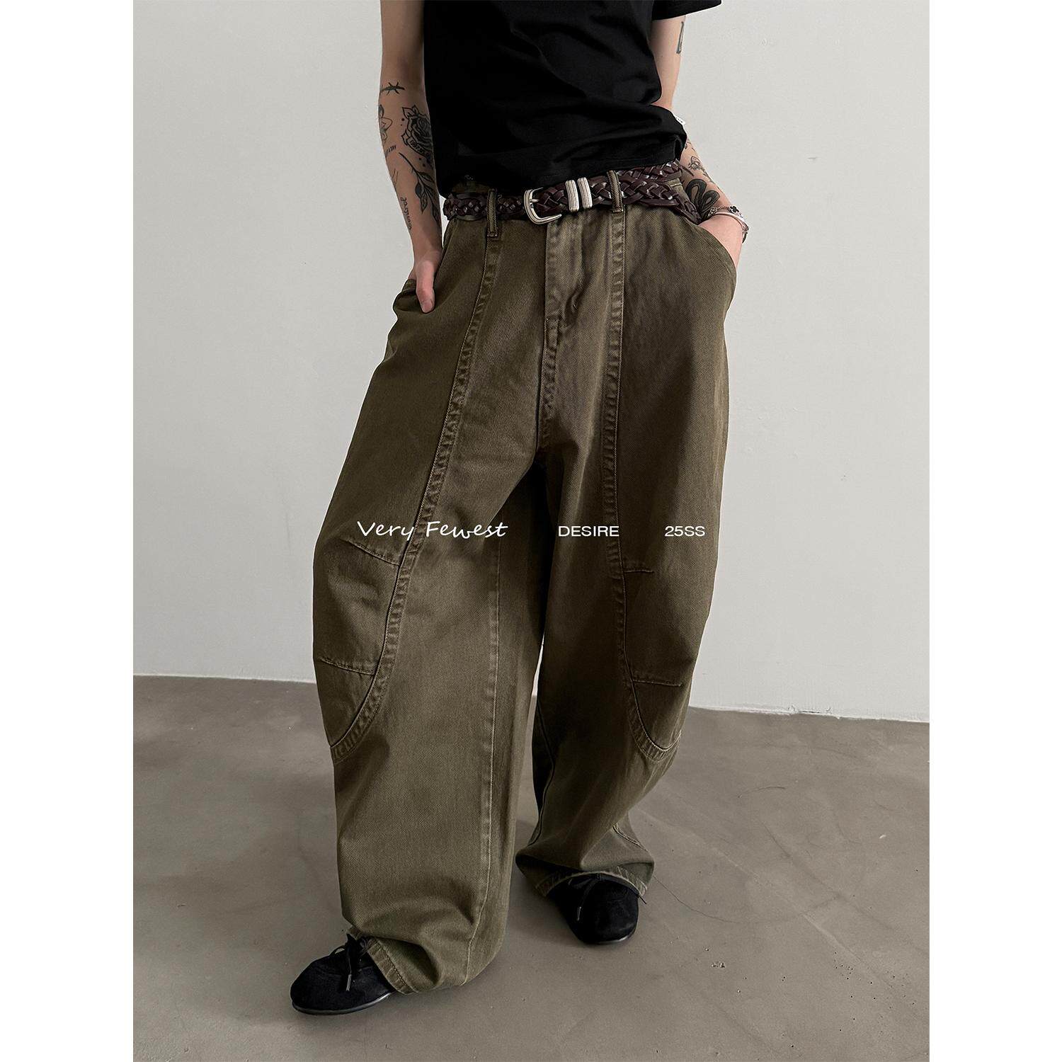 独特剪裁做旧水洗阔腿弯刀牛仔裤