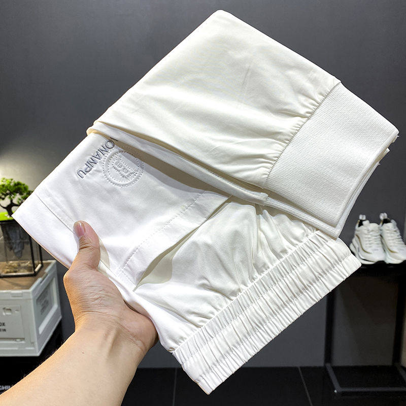 夏季休闲冰丝裤男款修身束脚裤运动百搭潮牌超薄白色夏天九分裤子