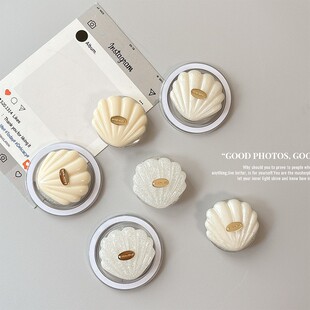 闪粉适用MagSafe气囊伸缩式桌面背贴支架贝壳立体磁吸手机支撑架