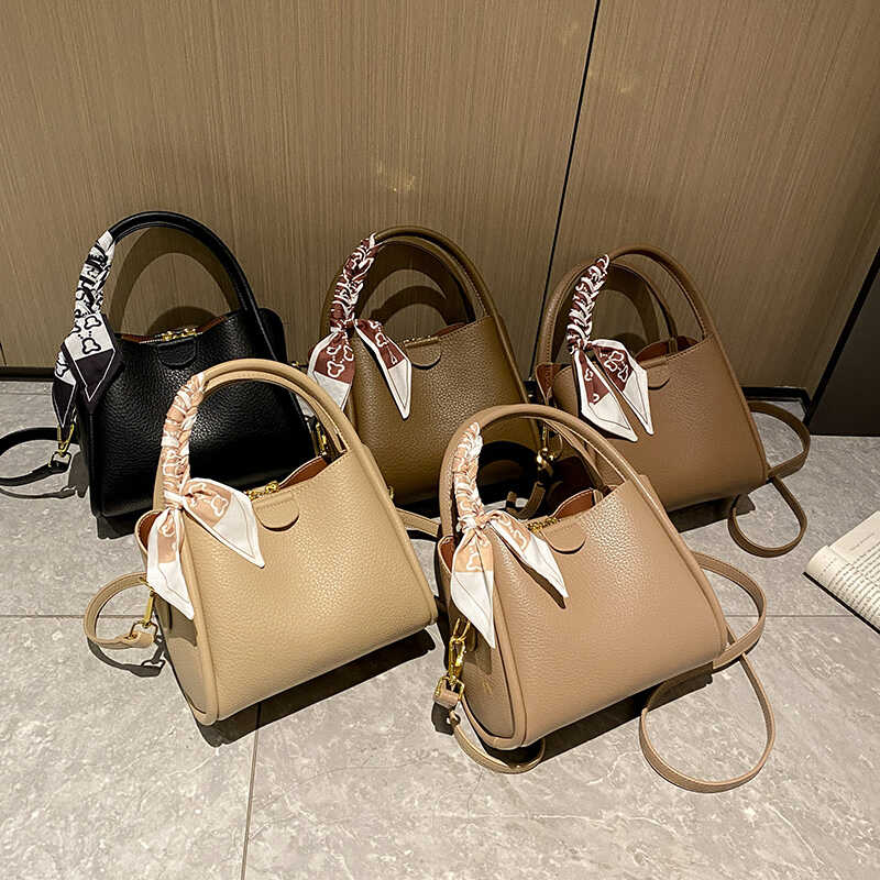 ins菜篮子女士斜跨包单肩包日韩手提包大容量真皮包包FALASHIDAI