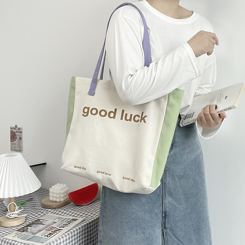 帆布袋女夏文艺通勤小众单肩包包2026新款ins学生日系上课手提袋