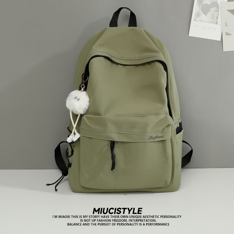 书包女大学生简约百搭大容量旅行防水电脑背包男高中生双肩包新款