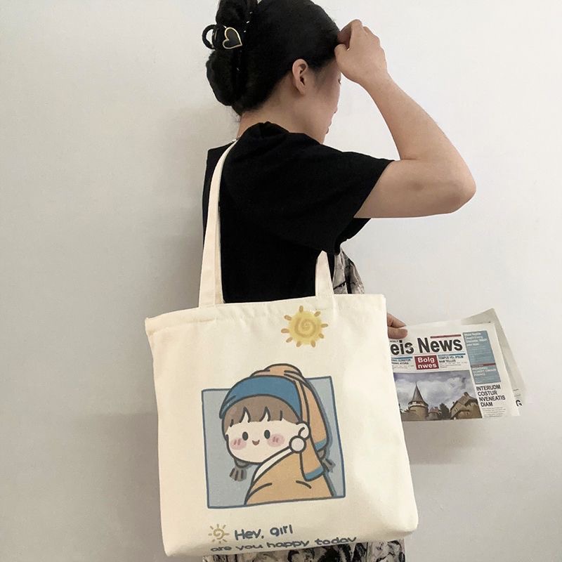 戴珍珠耳环的少女帆布包小清新日韩帆布袋学生上课书包通勤产检包