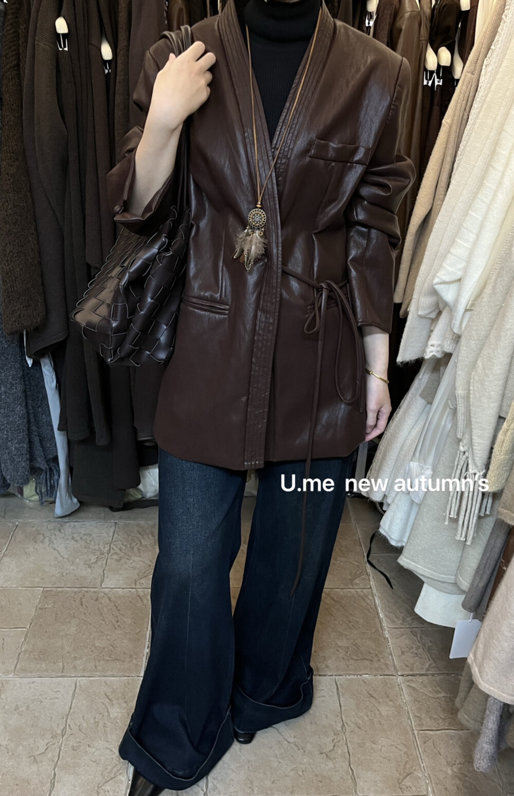 广州2025U.me高级感小众侧绑带收腰皮衣外套女宽松复古黑色上衣