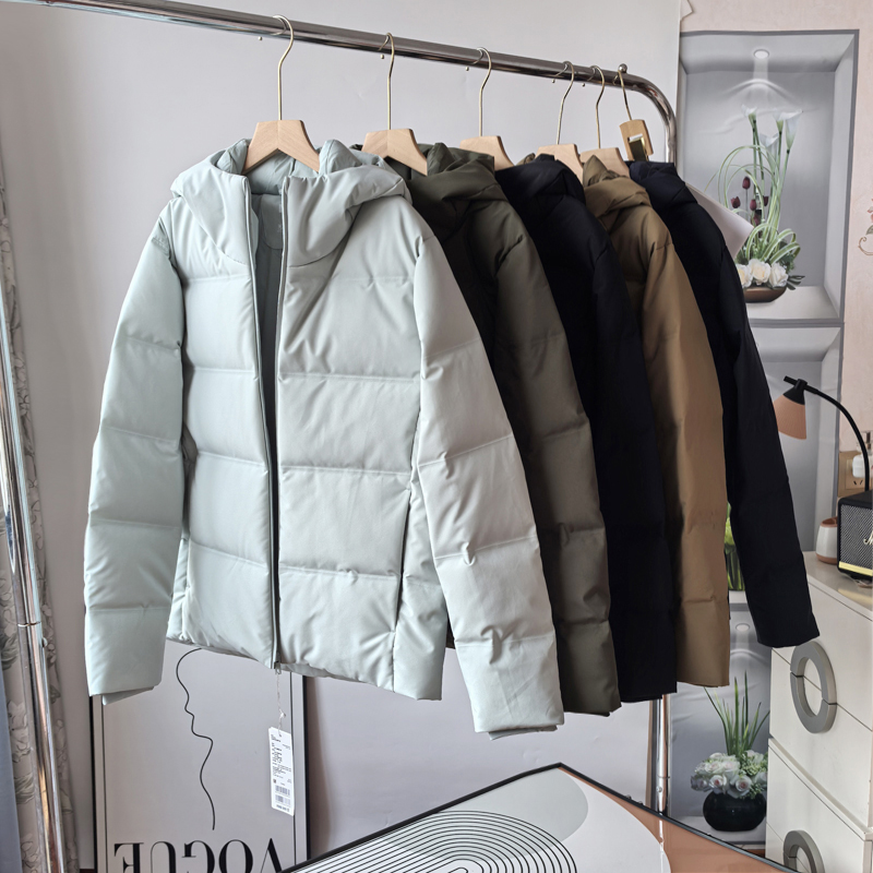 男女加厚保暧无缝压胶连帽羽绒服
