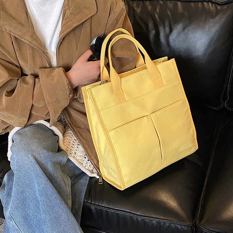 2026新款潮时尚帆布包女手提托特包大容量多口袋通勤包休闲单肩包,箱包皮具/热销女包/男包,时尚帆布包,淘宝优惠券,粉丝福利购,淘宝优惠卷