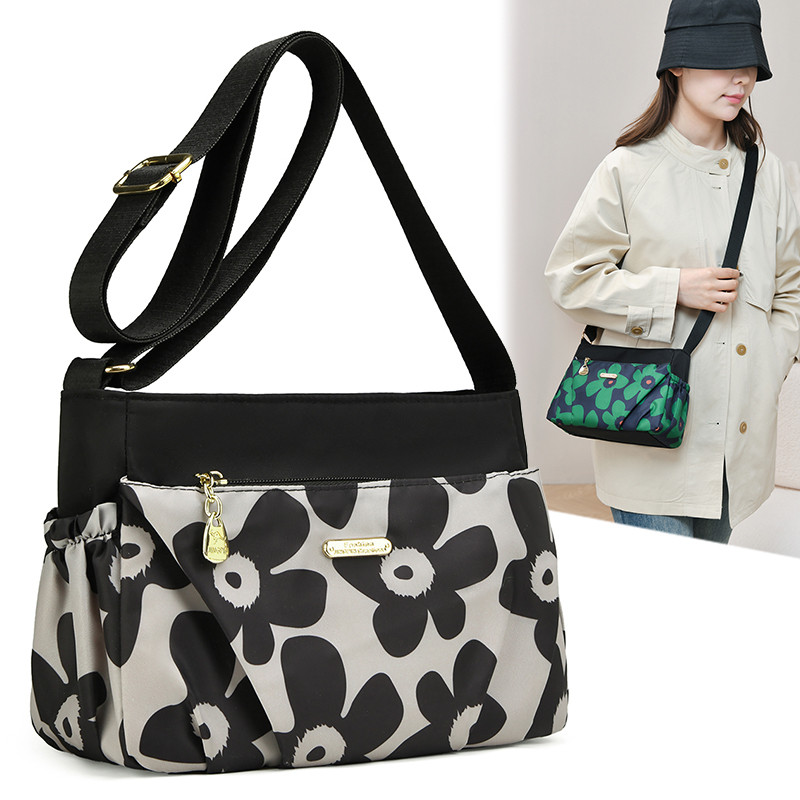 2026新款时尚印花尼龙布包包女单肩包大容量多层轻便防泼水斜挎包,箱包皮具/热销女包/男包,时尚帆布包,淘宝优惠券,粉丝福利购,淘宝优惠卷