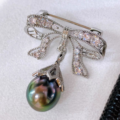 蝴蝶结流苏胸针毛衣链两用