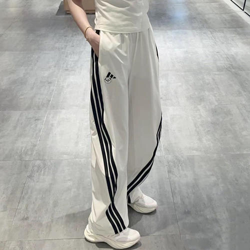 阿迪达斯女三条纹宽松运动长裤