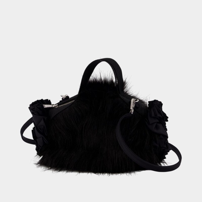 Simone Rocha 迷你双蝴蝶结手拿包-仿皮草-黑色