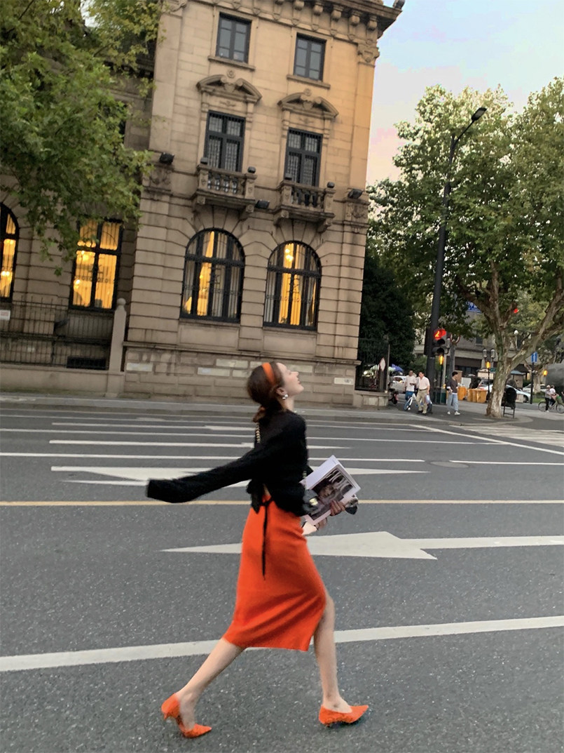 开叉橘红色针织裙女半身裙中长款高腰加厚显瘦2026春秋新款包臀裙