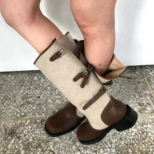 拼接粗跟牛仔靴筒2026穿女翻靴复古西部两骑士靴堆堆皮带扣折宽布