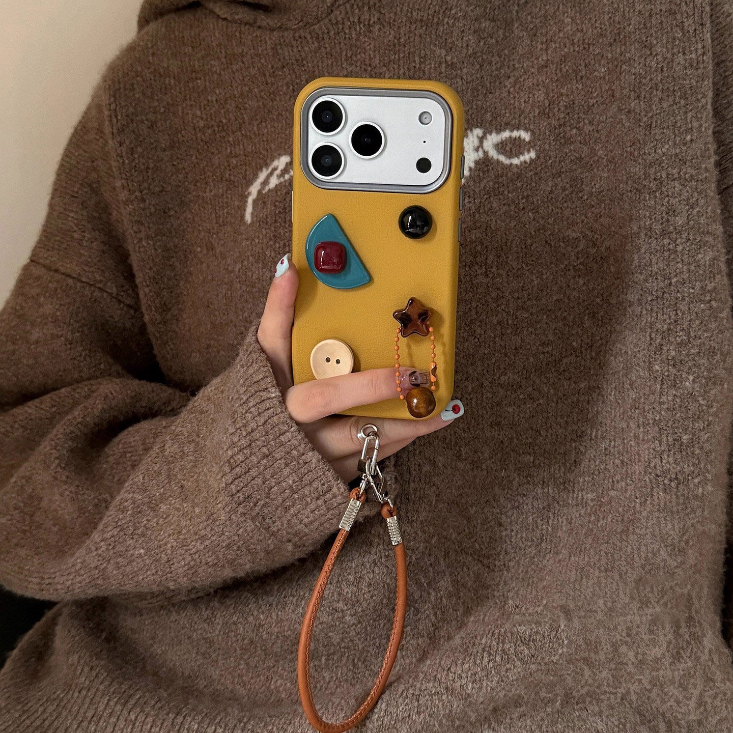 立体温暖姜黄宝石适用苹果17promax手机壳新款17带挂绳手提iPhone16/15Pro高级感小众创意14pm全包防摔保护套