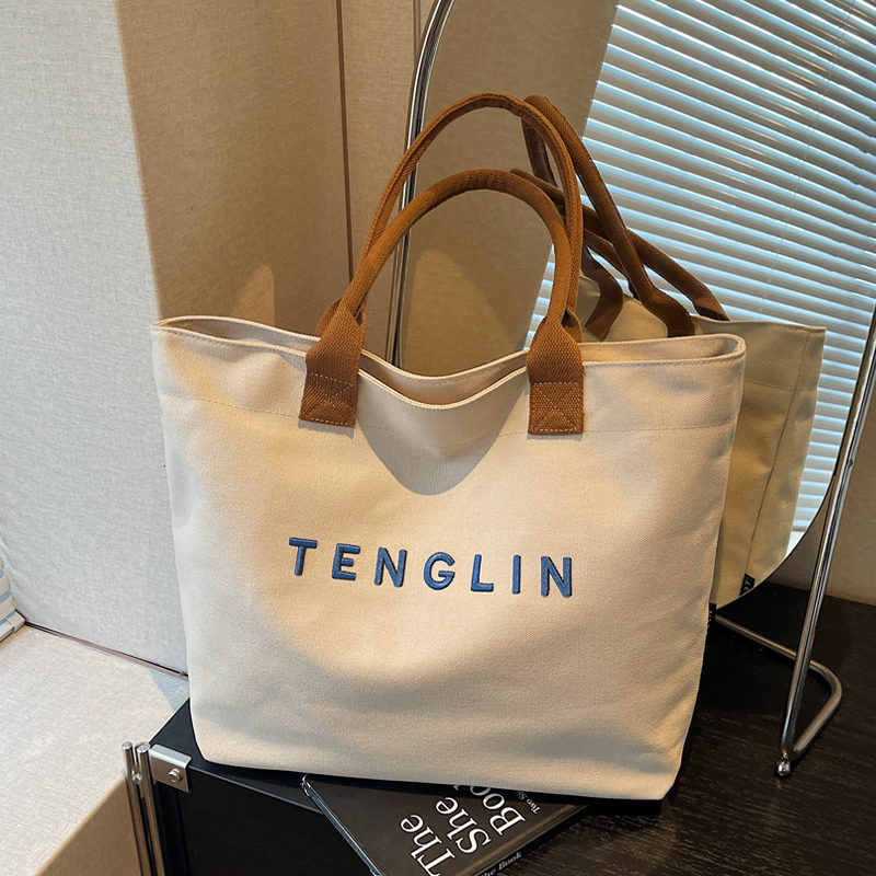 2025新款刺绣字母帆布托特包女大容量手提包百搭通勤学生单肩包