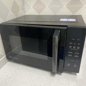 Midea/美的 PC2323W变频微波炉家用微蒸烤箱一体平板光波炉25升正