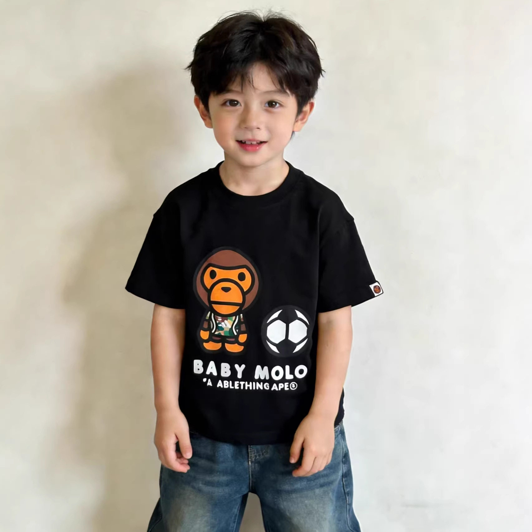 26新款夏季时尚猿人头儿童短袖印花男女童圆领时尚简约足球t恤