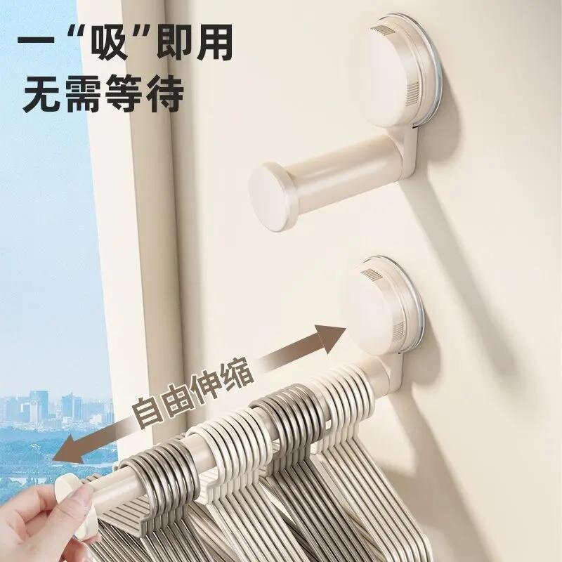 吸盘阳台衣架收纳神器多功能挂钩挂衣架置物架可伸缩卫生间晾衣杆