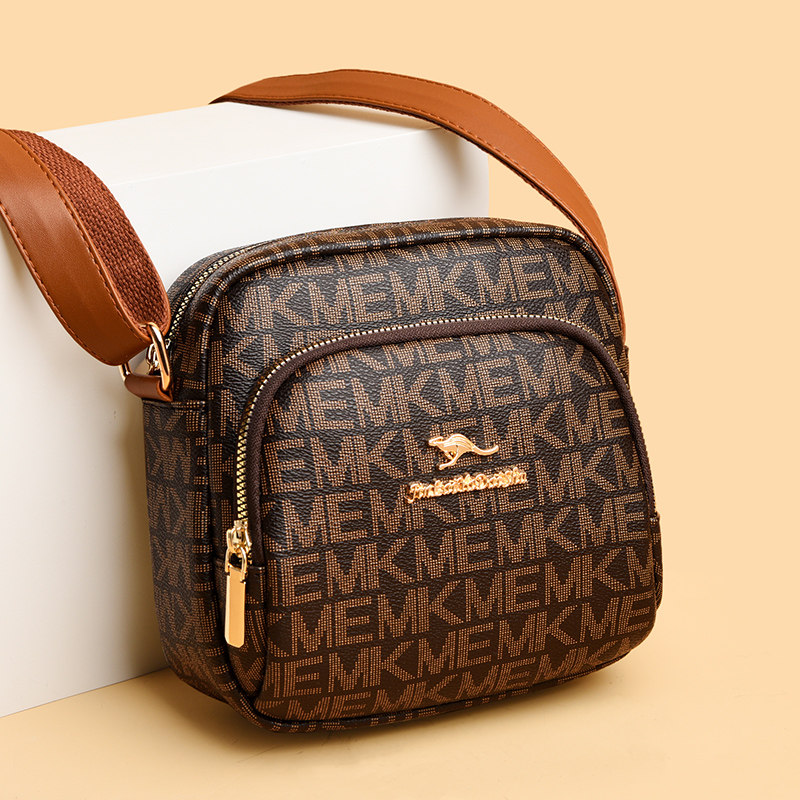 今年流行真皮小圆包女2026新款印花软皮手机零钱包百搭单肩斜挎包