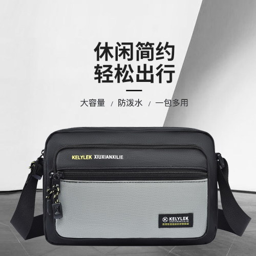 新款单肩包男士斜挎包牛津布小背包多层生意收钱包手机包商务男包
