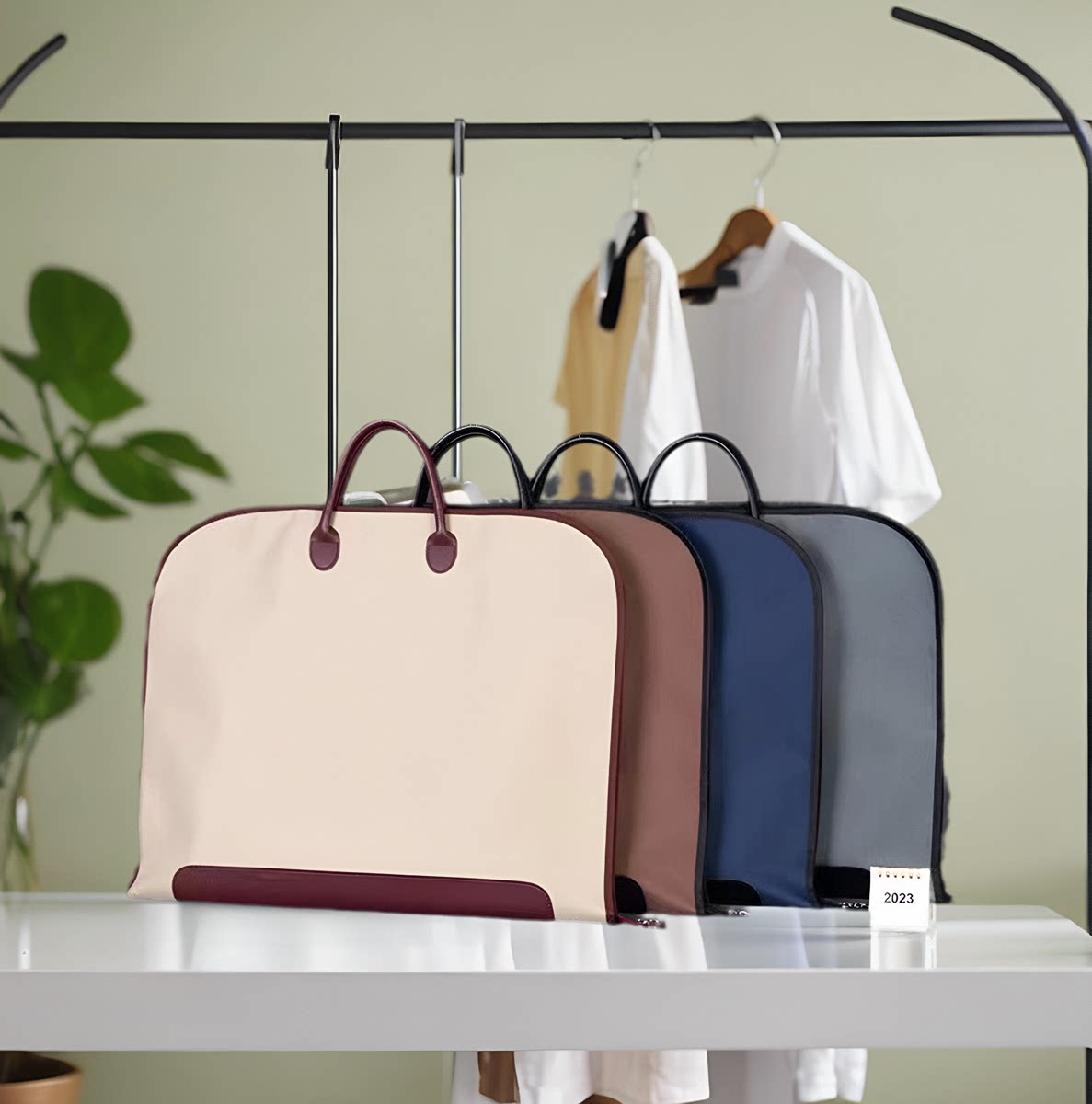 当季新品女士西服套装收纳袋彩色牛津布防尘袋服装店手提折叠防潮