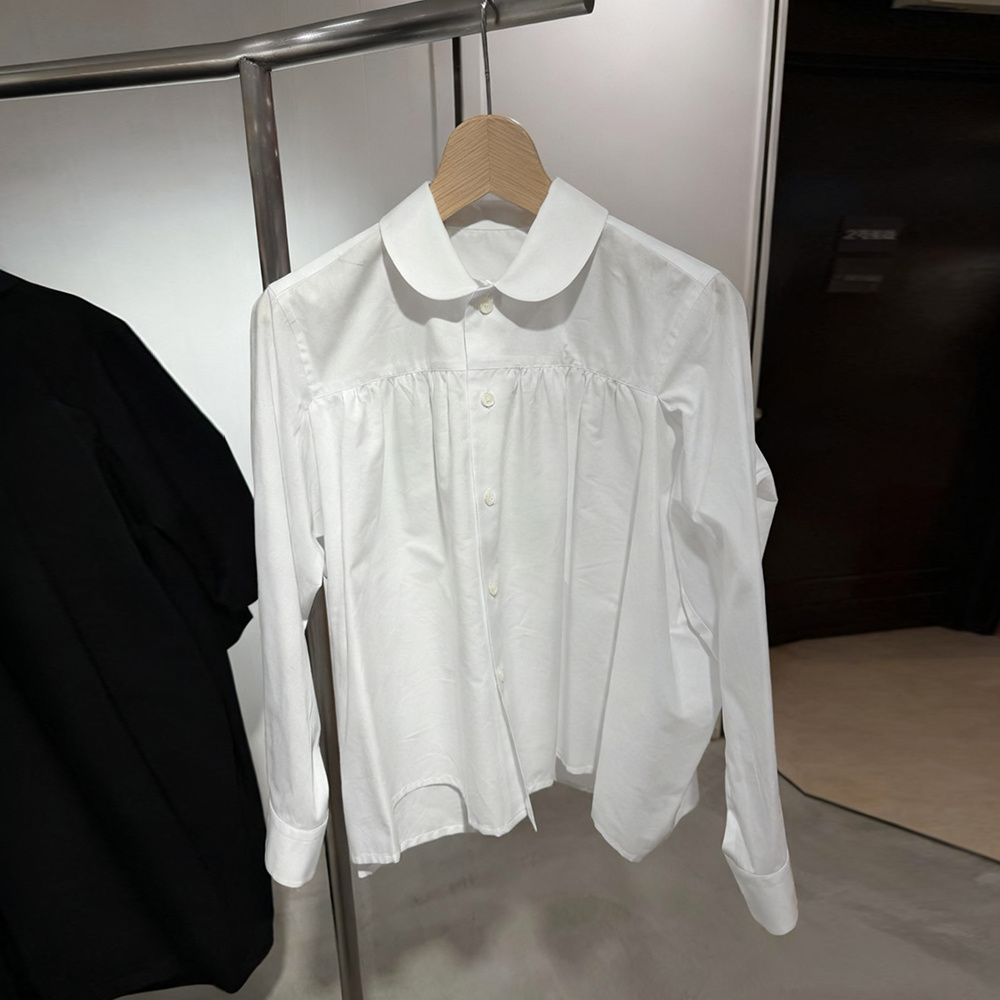 2025秋冬新款小众纯色娃娃领拼接长袖衬衫单排扣百搭休闲上衣女