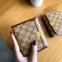 2019 mới ví thời trang châu Âu và Mỹ nữ da ngắn đoạn ba lần in ví nhiều thẻ da nhỏ - Ví tiền ví nam