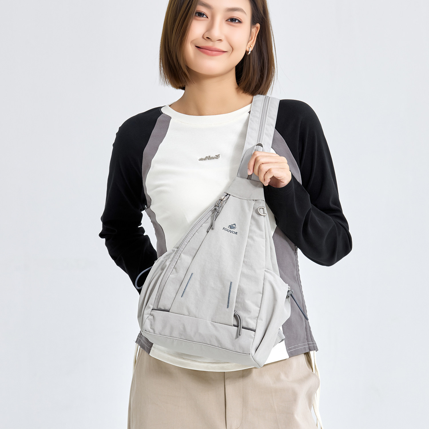 火狐2026新款单肩包女两用轻便休闲旅行包大容量帆布斜挎包胸包冬