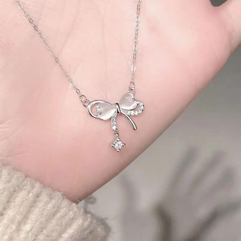 时尚潮流猫眼石蝴蝶结流苏项链女质感小众设计少女高级感心锁骨链