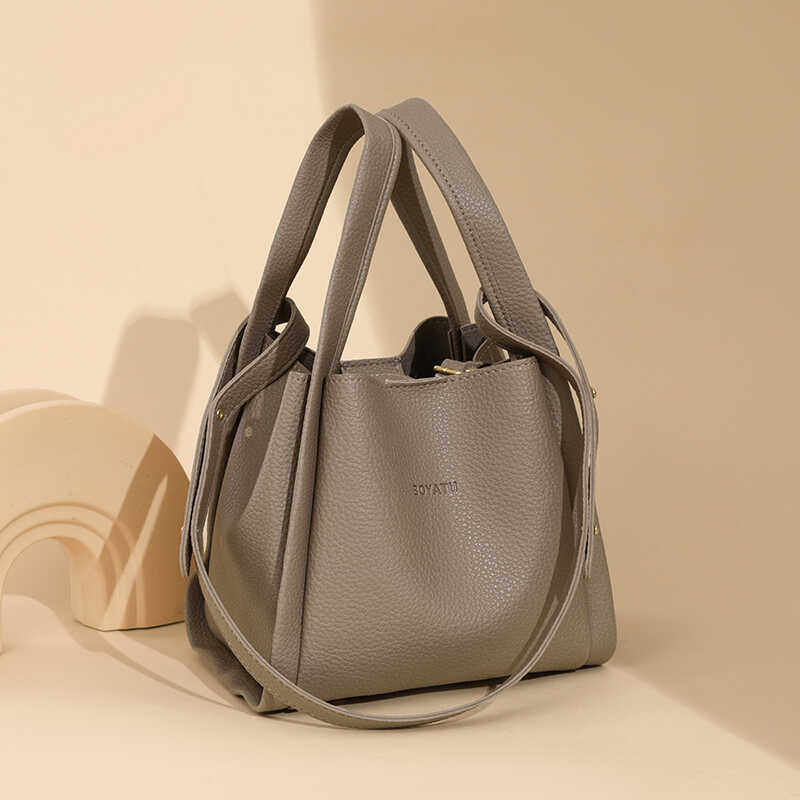 小众爆款包包女2025秋季新款斜挎包高级时尚水桶手提包单肩包,箱包皮具/热销女包/男包,水桶包,淘宝优惠券,粉丝福利购,淘宝优惠卷