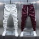 冬季 加绒刺绣拼接束脚休闲裤 百搭运动卫裤 潮男士 松紧腰宽松哈伦裤