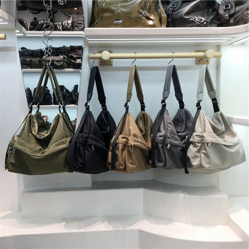 小脏柜 2026新款休闲运动风轻便通勤男女潮单肩斜挎尼龙布托特包,箱包皮具/热销女包/男包,通用款女包,淘宝优惠券,粉丝福利购,淘宝优惠卷