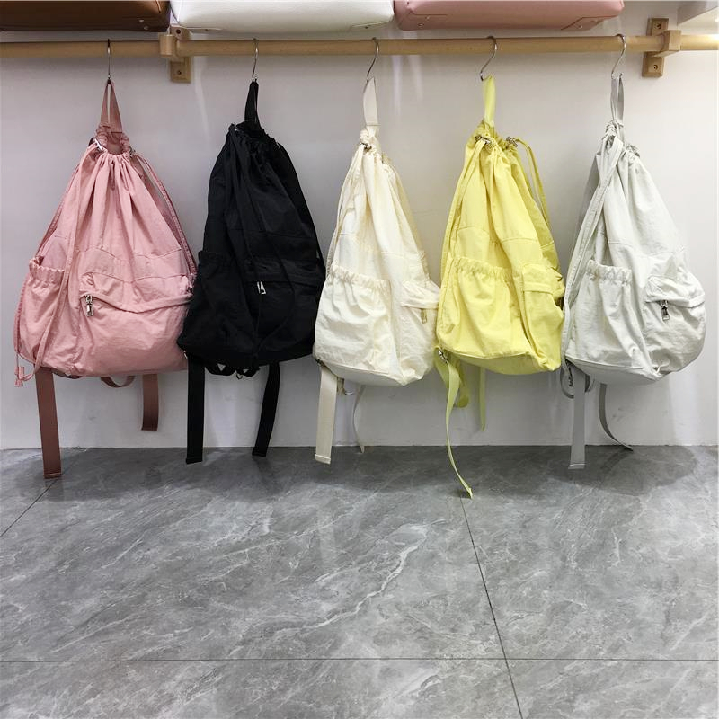 小脏柜 韩国春夏束口尼龙大容量简约休闲百搭双肩包轻便旅行背包