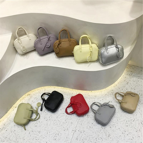 小脏柜 简约手提小方包波士顿百搭斜挎包日常通勤笑脸挂饰单肩包