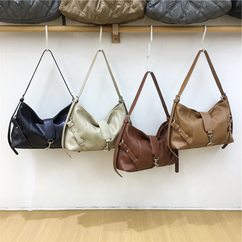 小脏柜 2025新款高级感手提腋下包小众轻奢复古女单肩斜挎油条包