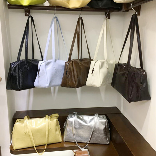 小脏柜 韩系复古保龄球包女2025新款百搭简约通勤单肩腋下枕头包